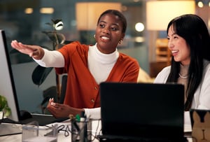 Women collaborating in office